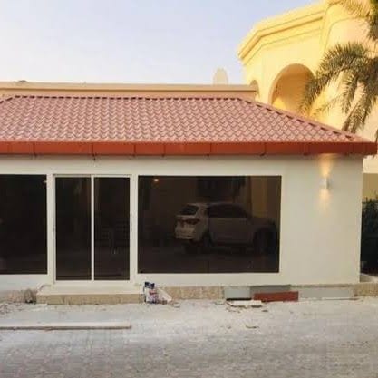 ملحق أرضي بسقف جملوني وتشطيب خارجي